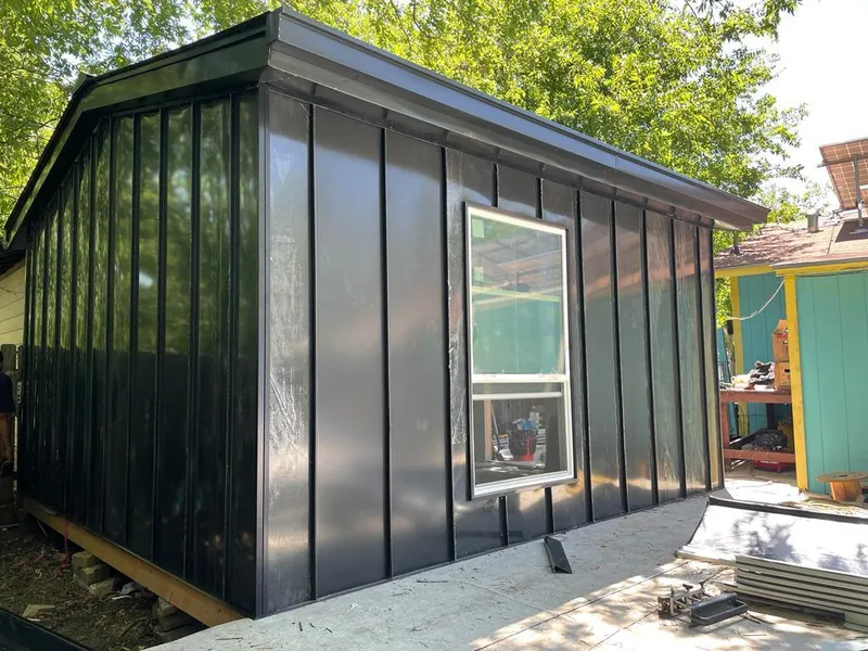 Black standing seam metal wall panels for Metal Roof Installation in Montague