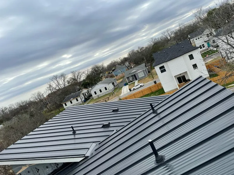 Standing seam metal roof panels with vents for Skylight Repair in Montague